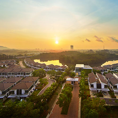 Waterfront homes and mangroves on the rivers of Senibong Cove taken at sunset